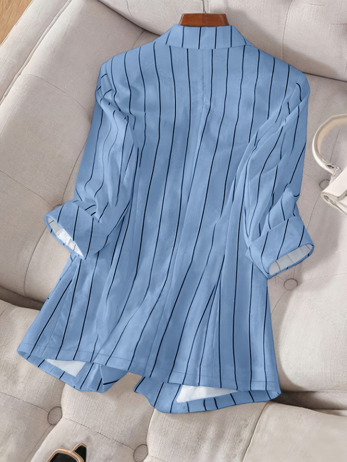 Spring Breeze Womens Light Blue  White Striped Elegant Tailored Blazer A stylish and versatile blazer perfect for spring summer and fall Flattering light blue and white stripes tailored fit for both casual and formal occasions