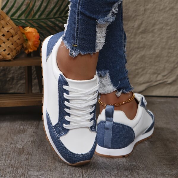 Stylish and comfortable Newness Cityscape Casual Fabric Sneakers perfect for everyday wear in any season The image shows the sneakers from an angle showcasing the fabric texture and design details