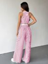 The Newness Riviera Striped Trouser Set in a flattering pose showcasing its relaxed fit and chic style Model is wearing the matching top and trousers