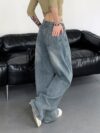 Newness Parisian High Waisted Wide Leg Jeans Flattering comfortable wide leg jeans in a chic style Model wearing light wash denim