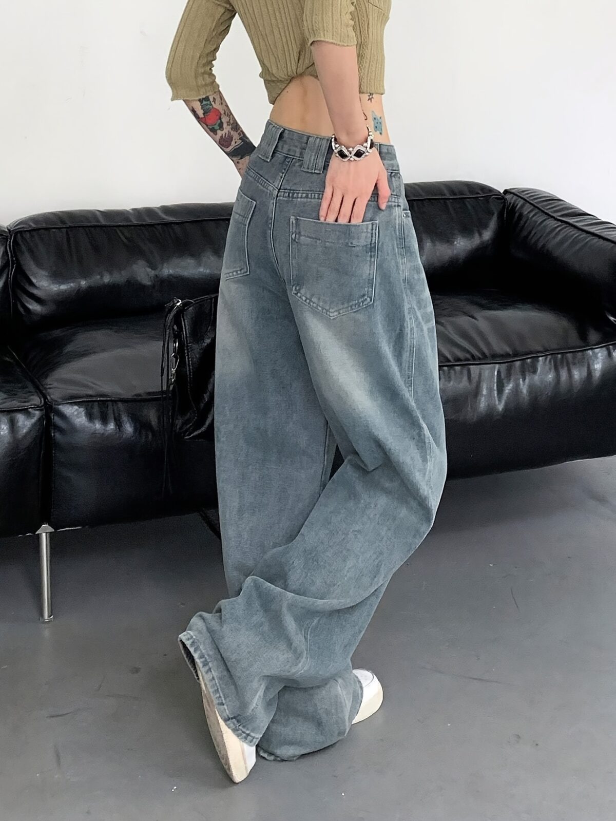 Newness Parisian High Waisted Wide Leg Jeans Flattering comfortable wide leg jeans in a chic style Model wearing light wash denim