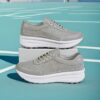 Newness Womens Elevated Edge Platform Sneakers Comfortable breathable and stylish platform sneakers in white showcasing the platform sole and breathable fabric