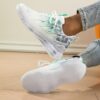 Womens Cloudwalk Breathable Casual Sneakers by Newness in white showcasing the breathable fabric and comfortable EVA sole Modern design for all day wear