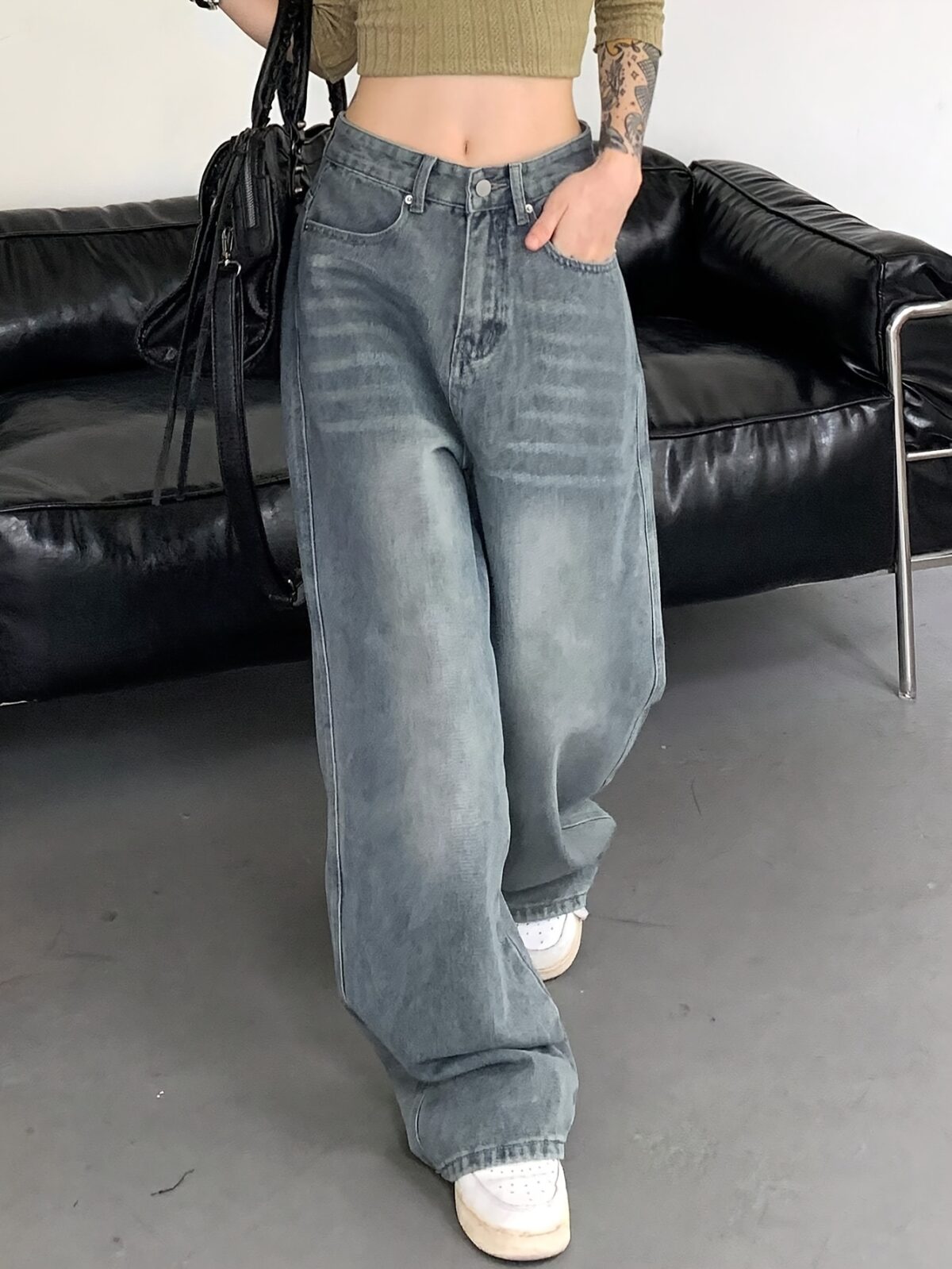 Newness Parisian High Waisted Wide Leg Jeans Flattering comfortable wide leg jeans in a chic style Model wearing light wash denim