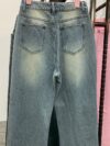 Effortless Chic Wide Leg Jeans by Newness in premium denim showcasing a modern and chic wide leg silhouette