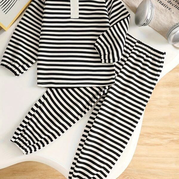 Adorable boys striped two piece outfit perfect for spring and autumn Stylish and comfortable for outdoor play Shop Newness for kids clothing