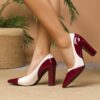 Newness Metropolitan Pointed Block Heel Pumps Chic black pumps with a pointed toe and comfortable block heel perfect for any occasion