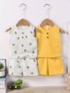 Adorable baby boy in a trendy Newness cactus print outfit featuring a waffle knit vest and pants Perfect summer clothes
