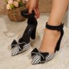 Chic black and white houndstooth plaid bow pumps Mary Jane style pointed toe comfortable block heel Dubai design