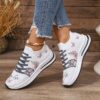 Newness Bloomsbury Floral Print Sneakers Chic and comfortable floral print sneakers perfect for any season View the stylish design