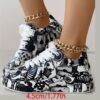 Newness Street Chic Graffiti Print Sneakers Elevate your street style with these chic comfortable and durable sneakers featuring a bold graffiti print