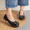 Womens elegant low heel flats with a 3D bow detail round toe and soft synthetic cover Shown in Color Name