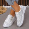 Newness City Chic White Zipper Sneakers Elevate your style with these chic and comfortable white sneakers perfect for any occasion