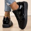 Newness Sleek  Chic Womens Glossy Sneakers in white showcasing their glossy finish and comfortable design Perfect for effortless style