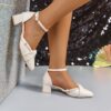 Newness Parisian Chic Pointed Toe Mary Janes in black showcasing the elegant pointed toe and delicate strap detail Perfect for adding a touch of Parisian chic to any outfit
