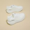 Stylish and comfortable womens breathable mesh sneakers in white showcasing the airy mesh upper and modern design Perfect for everyday wear or workouts