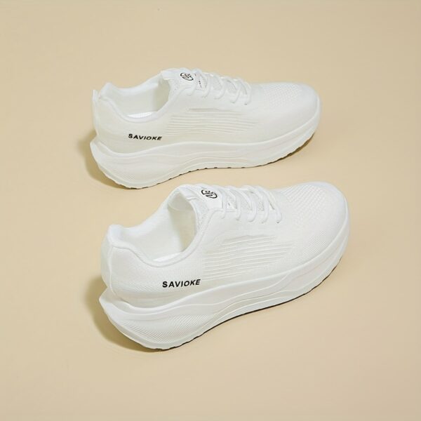 Stylish and comfortable womens breathable mesh sneakers in white showcasing the airy mesh upper and modern design Perfect for everyday wear or workouts