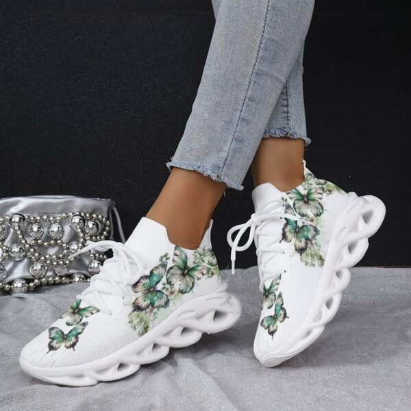 Newness Whimsical Butterfly Print Sneakers Chic and comfortable sneakers featuring a playful butterfly print perfect for any occasion
