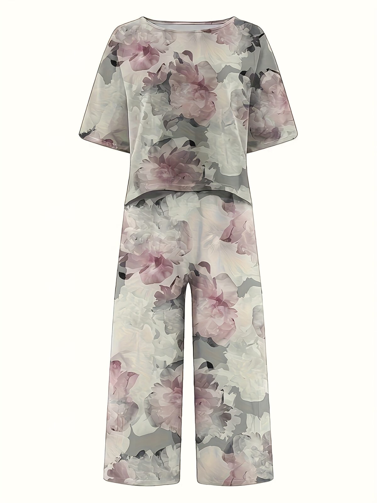 Effortless style meets ultimate comfort in the Newness Casablanca Floral Print Set This stunning 100 polyester two piece set features a vibrant floral print perfect for any occasion