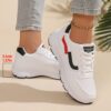 Newness City Chic White Accent Sneakers Modern white sneakers with stylish accents perfect for any occasion