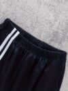 Stylish black hoodie and pants set for kids perfect for cozy autumn days Made of comfortable polyester