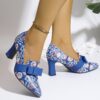 Newness Printed Mary Jane Pumps with Bow Embellishment Chic and comfortable pumps featuring a vibrant print and delicate bow detail perfect for any occasion