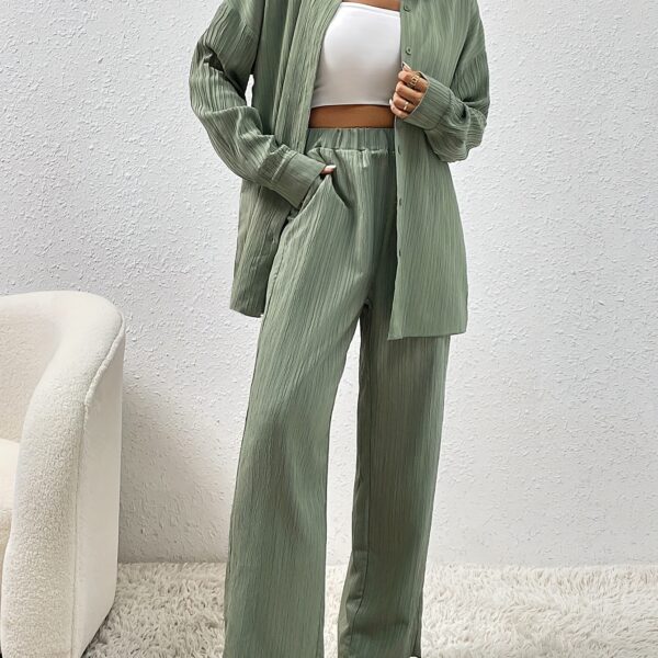 Model wearing the Newness Dubai Nights Off Shoulder Pants Set a luxurious polyester two piece outfit featuring an off shoulder top and wide leg pants perfect for evening events