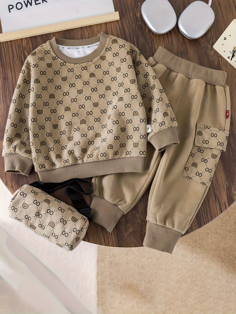 Newness Cozy Cub 3-Piece Boys' Winter Outfit Set: stylish navy blue hoodie, joggers, and matching drawstring bag. Perfect for back-to-school, holidays, or everyday wear.