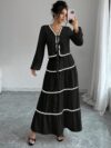 Effortlessly chic Casablanca Tiered Maxi Skirt Set from Newness Model showcasing the complete set featuring a flowing maxi skirt with tiers and a coordinating top
