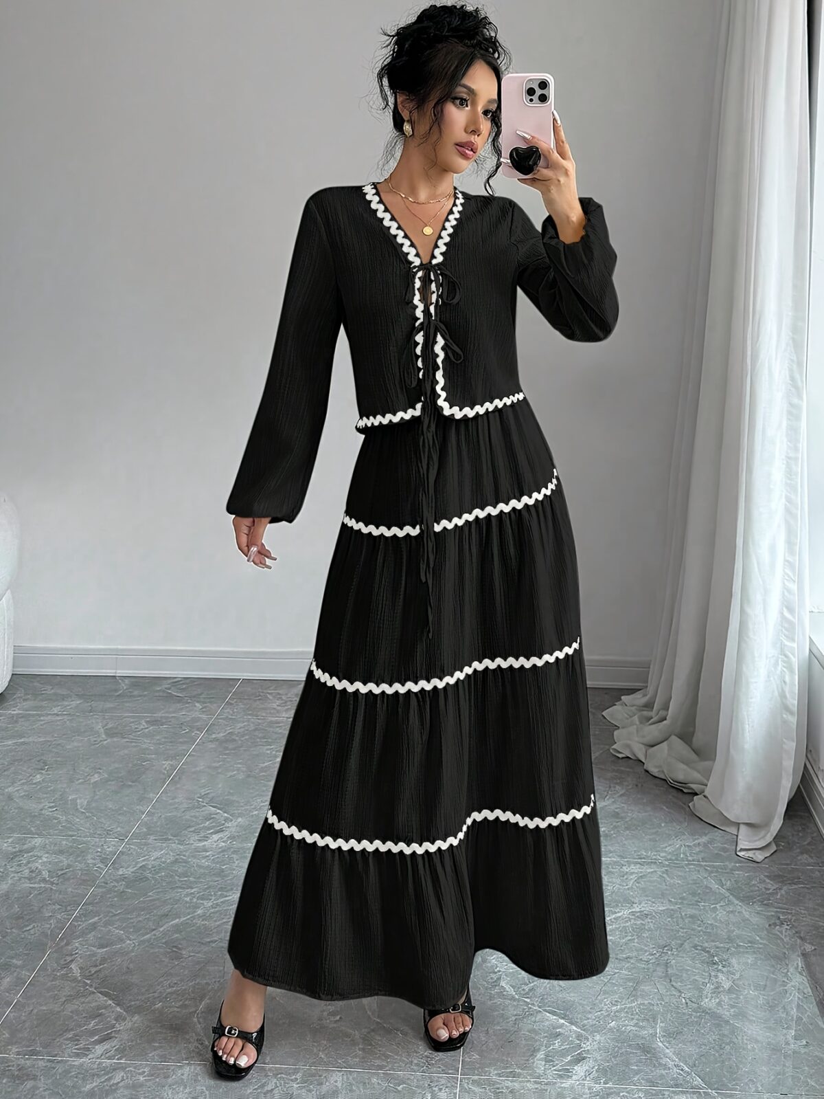 Effortlessly chic Casablanca Tiered Maxi Skirt Set from Newness Model showcasing the complete set featuring a flowing maxi skirt with tiers and a coordinating top