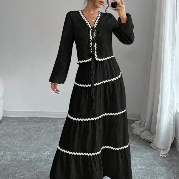 Effortlessly chic Casablanca Tiered Maxi Skirt Set from Newness Model showcasing the complete set featuring a flowing maxi skirt with tiers and a coordinating top