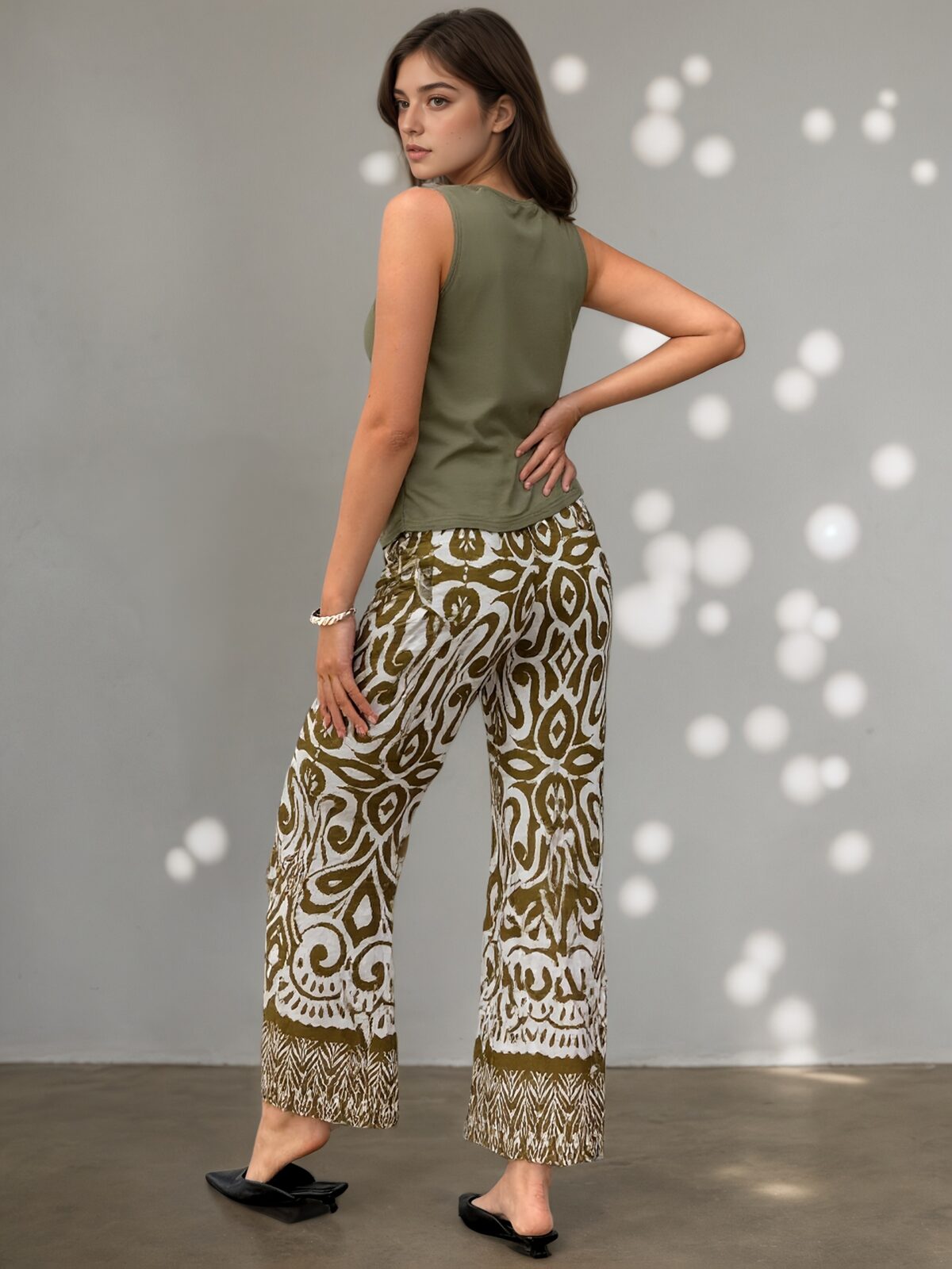 Effortlessly chic Oasis Escape Geometric Two Piece Set in a flattering silhouette perfect for a summer getaway Model wears a matching geometric print top and bottom