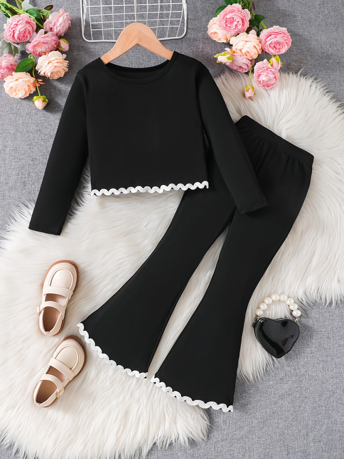 Newness girls chic ruffle pants set in pink ideal for spring and autumn The set features a comfortable top and stylish pants with ruffles