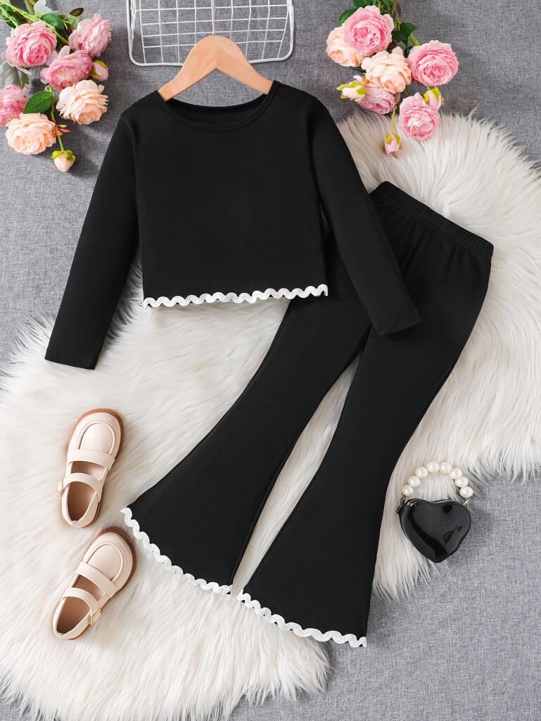 Newness girls' chic ruffle pants set in pink, ideal for spring and autumn. The set features a comfortable top and stylish pants with ruffles.