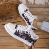 Newness Rebel Chic Skull Print Sneakers Edgy chic and comfortable sneakers with a skull print design