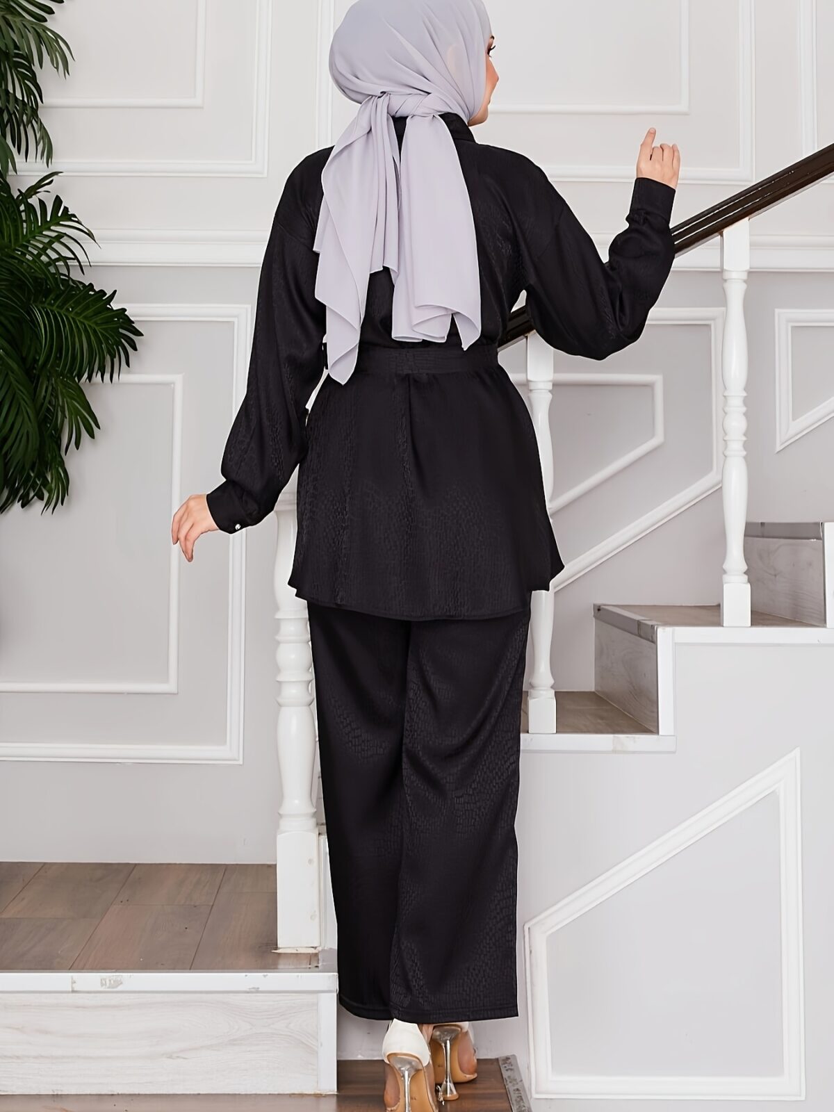 The Newness Executive Two Piece Workwear Set in luxurious polyester showcasing a chic and comfortable silhouette perfect for the modern professional