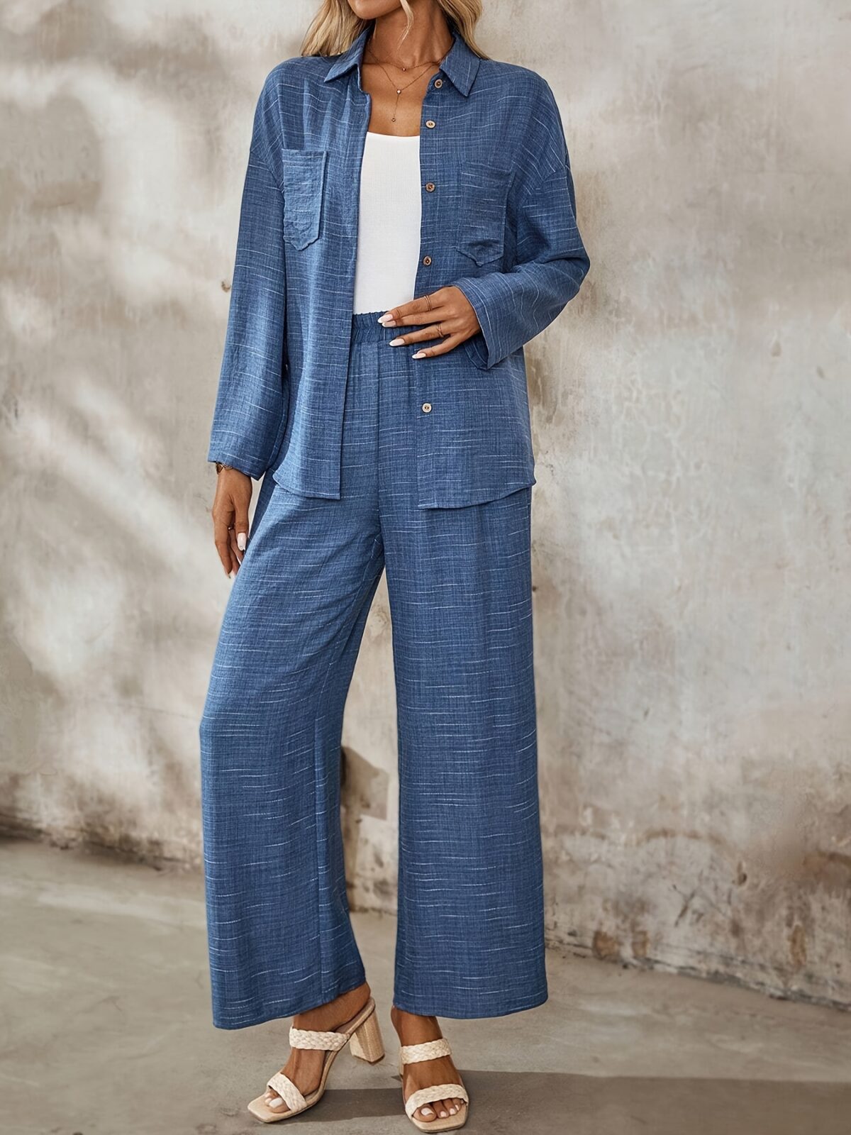 The Newness Dubai Chic Two Piece Pant Set in a flattering modern design perfect for spring or fall A stylish woman confidently wears the matching pants and top
