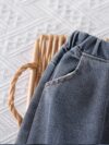 Stylish boys two piece autumnwinter outfit featuring a trendy letter print hoodie and comfortable jeans perfect for back to school holidays or parties