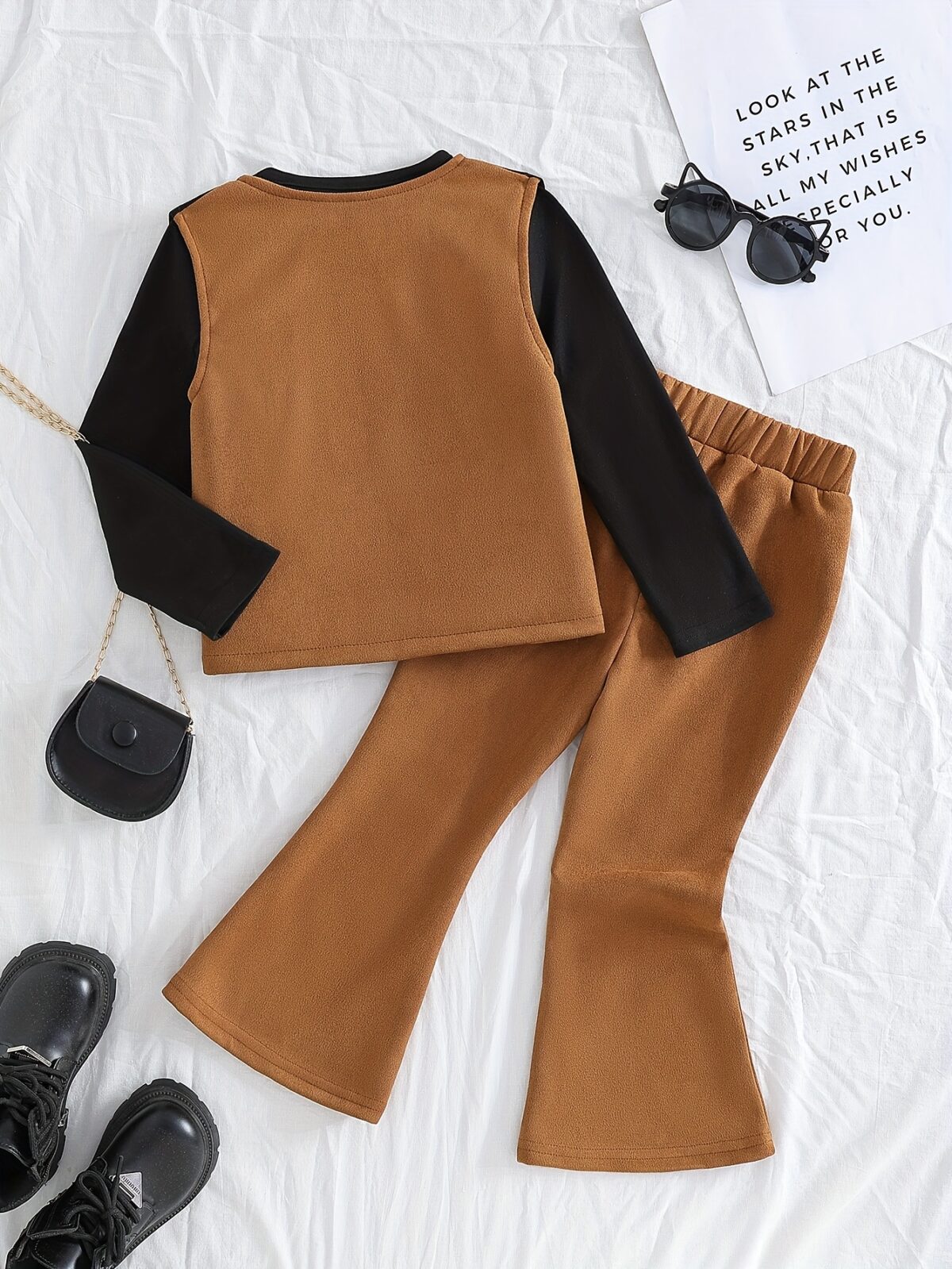 Adorable girl twirling in the Newness Starlight Dreams Girls Western Set showcasing its sparkly details and stylish western design Perfect for parties or playtime