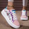 Newness Pastel Dream Butterfly Print Sneakers Chic and comfy pastel sneakers with a beautiful butterfly print perfect for spring