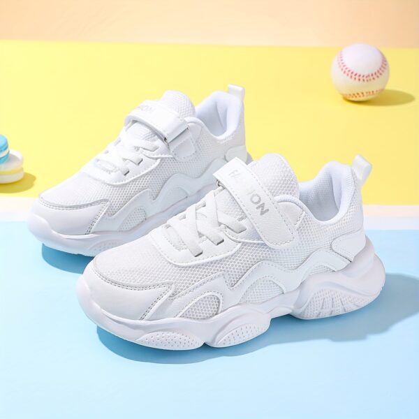Stylish and comfortable ActiveAce Kids' Low-Top Tennis Shoes in action. A child is shown wearing the shoes, running and playing. Breathable mesh and synthetic upper are visible, highlighting the shoe's lightweight and durable design. Perfect for all-season wear.