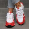 Newness City Chic Striped Athletic Sneakers Stylish striped sneakers perfect for everyday wear Close up view showcasing the chic design and comfortable athletic build