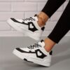 Newness Monochrome Magic Heart Pattern Sneakers Stylish monochrome heart pattern sneakers offering sporty comfort