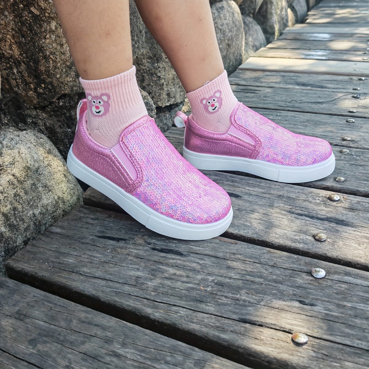 Girls glitter canvas shoes Sparkle Steps in pink showcasing the sparkly glitter fabric and comfortable design Perfect for adding a touch of glam to any outfit