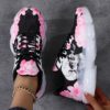 Newness Dark Bloom Skull Print Sneakers Edgy chic sneakers with a skull print perfect for elevating any look