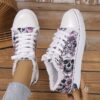Newness Rebel Chic Skull Print Sneakers Edgy chic and comfortable sneakers with a skull print design