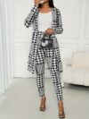 The Newness Chic Houndstooth Pant Set a stylish and modern two piece outfit perfect for spring Features a houndstooth print on both the pants and coordinating top