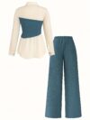Model wearing the Newness Metropolitan Chic Two Piece Pant Set a stylish and comfortable pant set perfect for the office or everyday wear The set includes a matching top and pants in a versatile color