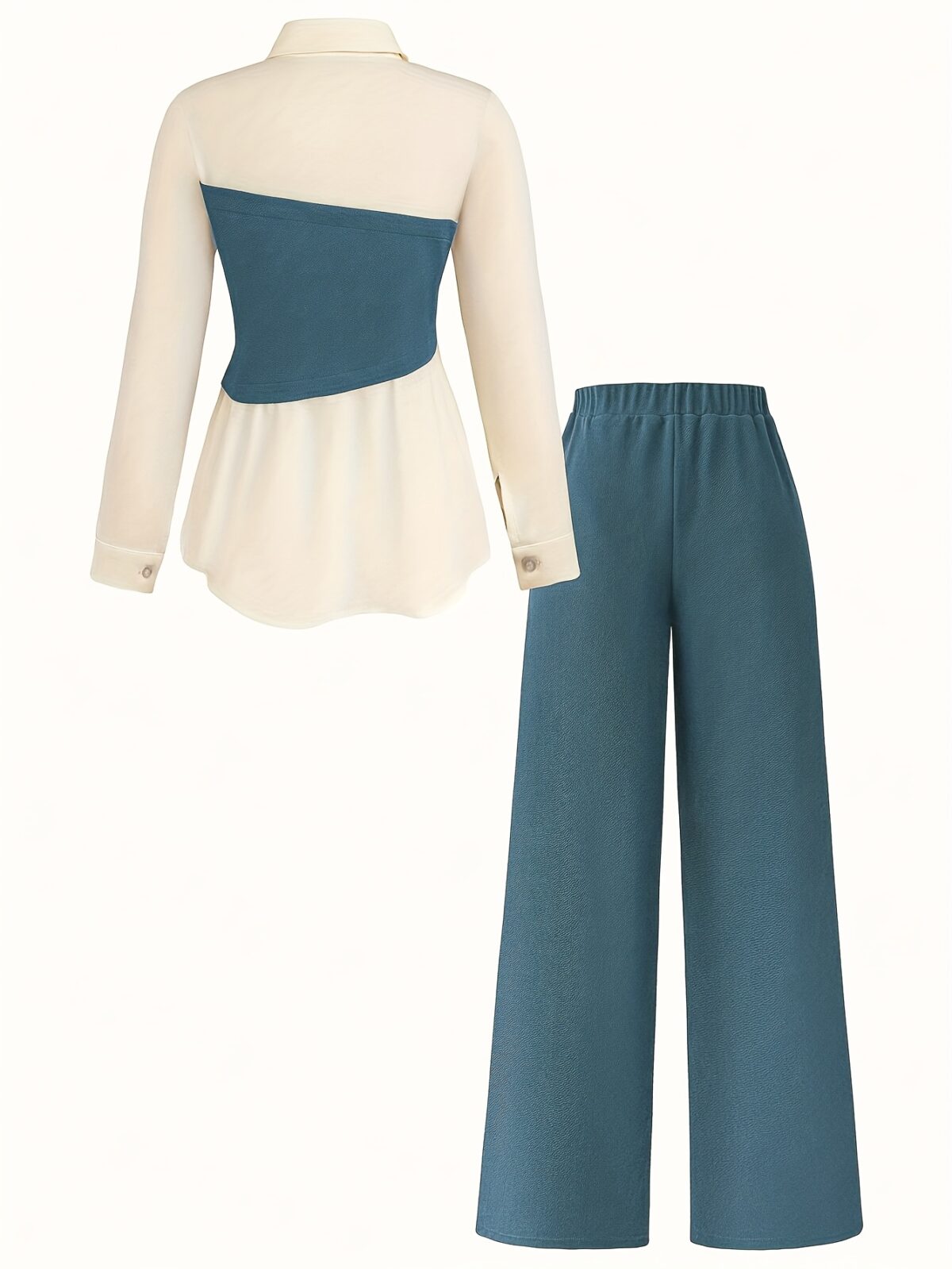 Model wearing the Newness Metropolitan Chic Two Piece Pant Set a stylish and comfortable pant set perfect for the office or everyday wear The set includes a matching top and pants in a versatile color