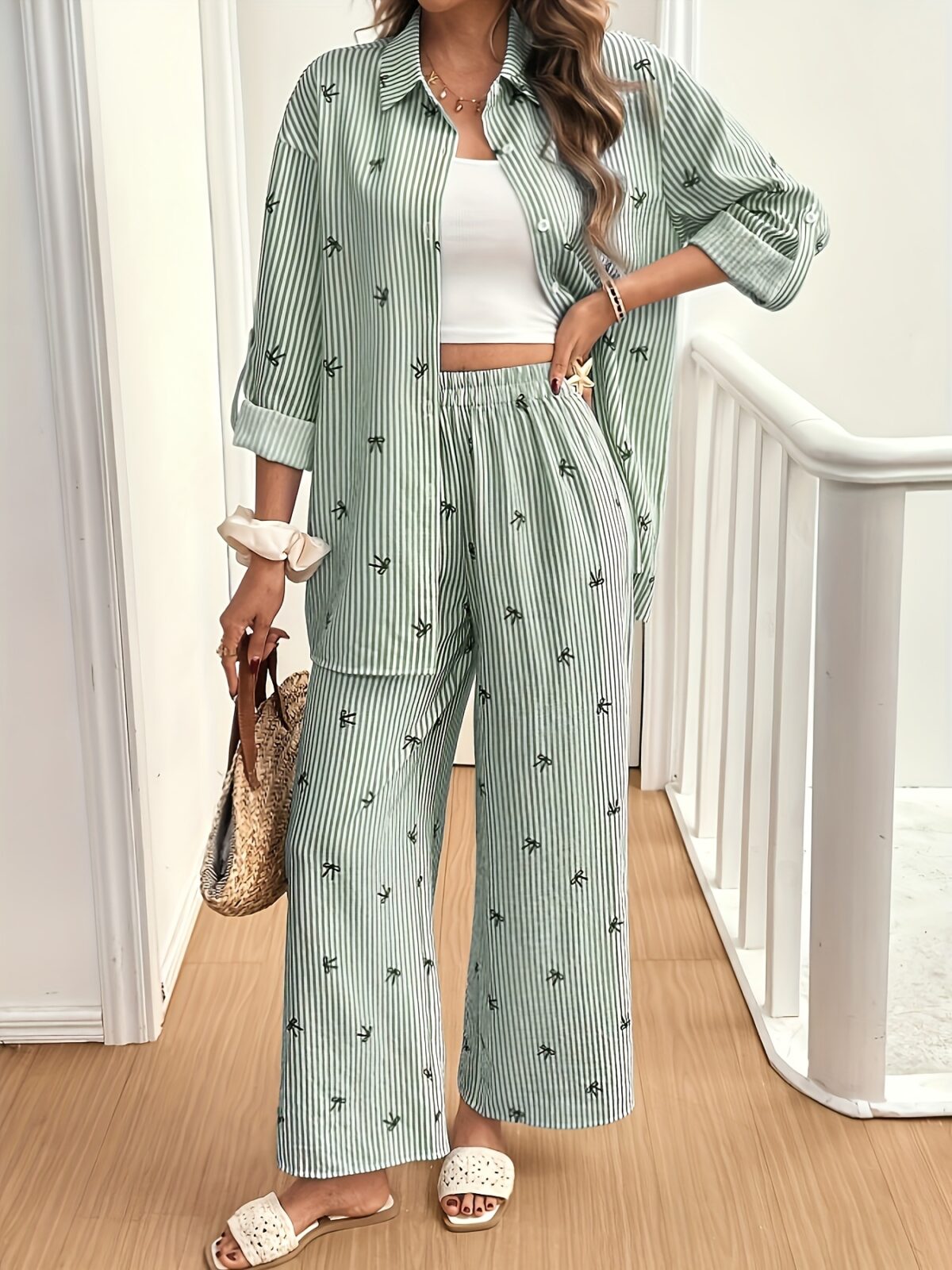 Effortless Chic The Parisian Striped Lounge Set in soft polyester A stylish two piece set perfect for relaxing at home Model wearing the matching striped top and pants